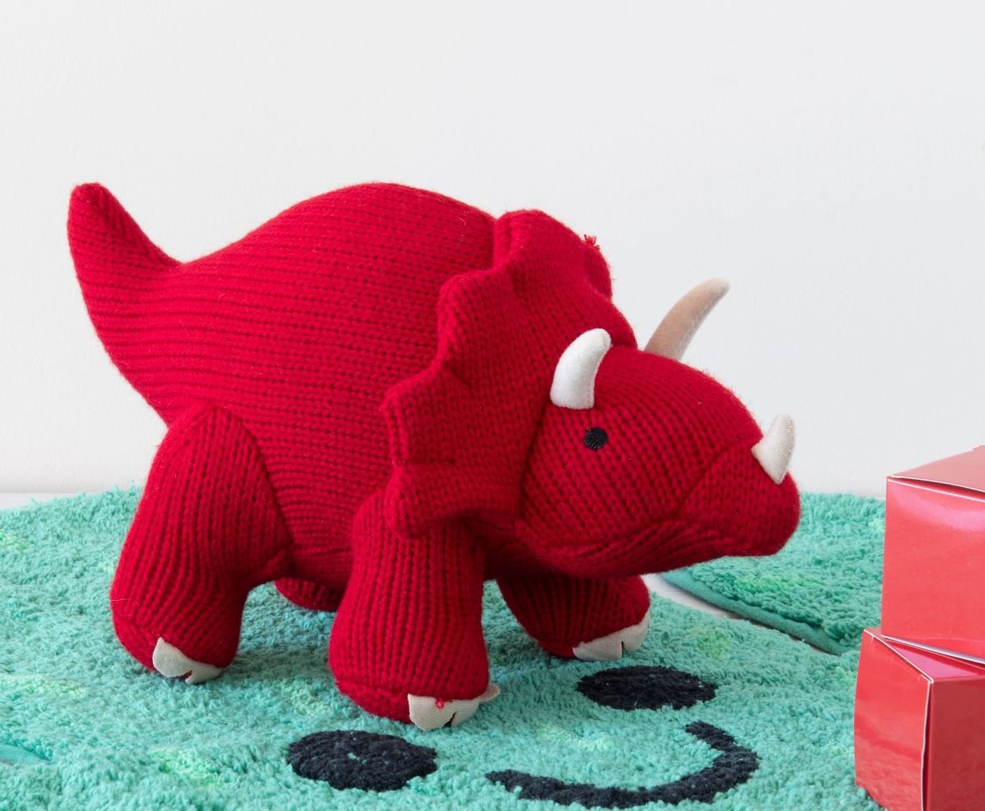 Triceratops Knitted Rattle Red