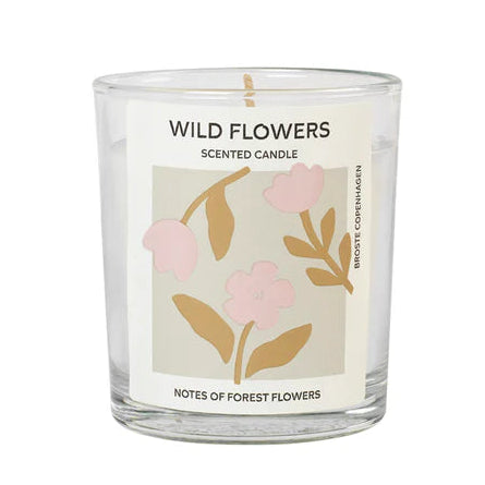 Scented candle labeled 'Wild Flowers' with floral design on a white background