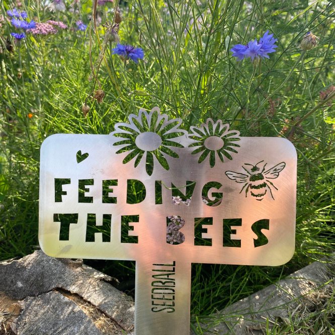 Feeding the Bee Sign